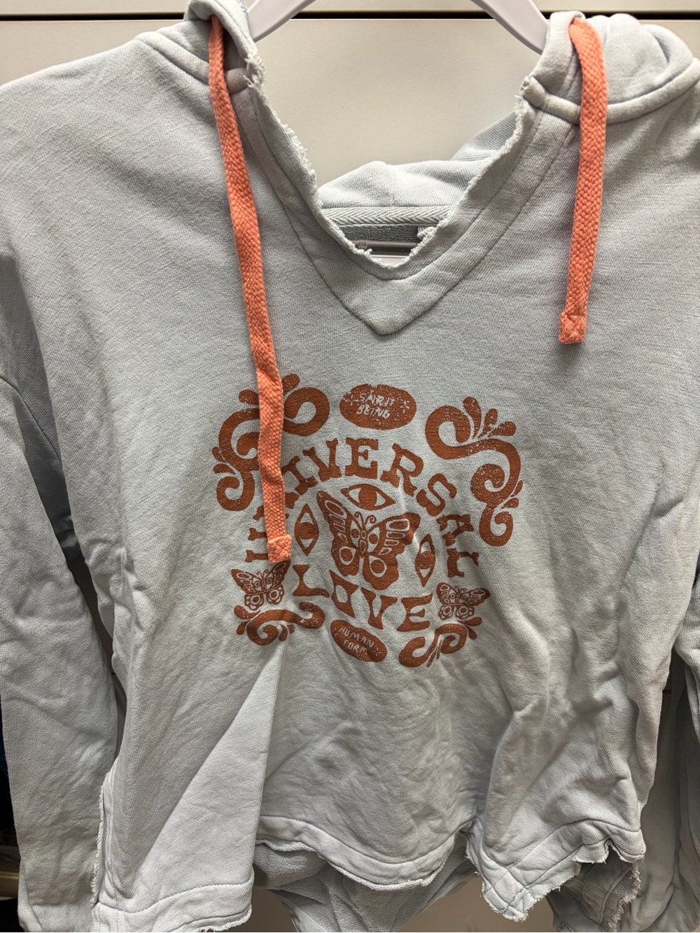Anthropologie Light Gray Hoodie with Orange Graphic & Drawstrings